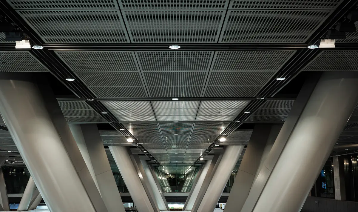 Metal false ceiling design created using aluminium and steel panels. Metal false ceiling design created using aluminium and steel panels.